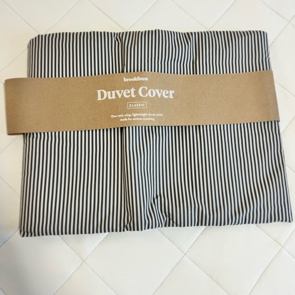 Brooklinen Classic Slate and White Pinstripe Duvet Cover and Core Sheet Set.